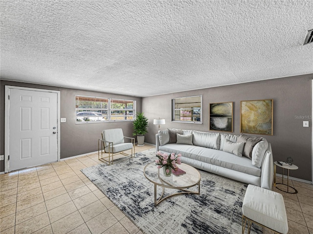 1720 Kendrick Ln, Lakeland, FL 33805 - living room featuring tile patterned floors and a textured ceiling