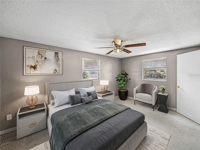 1720 Kendrick Ln, Lakeland, FL 33805 - bedroom featuring a ceiling fan, multiple windows, and baseboards