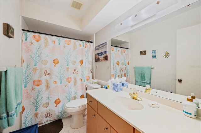 bathroom featuring visible vents, tile patterned floors, vanity, and toilet