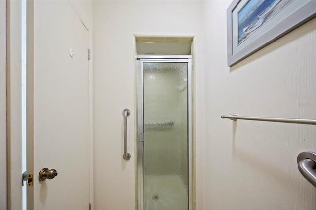 full bathroom featuring a stall shower