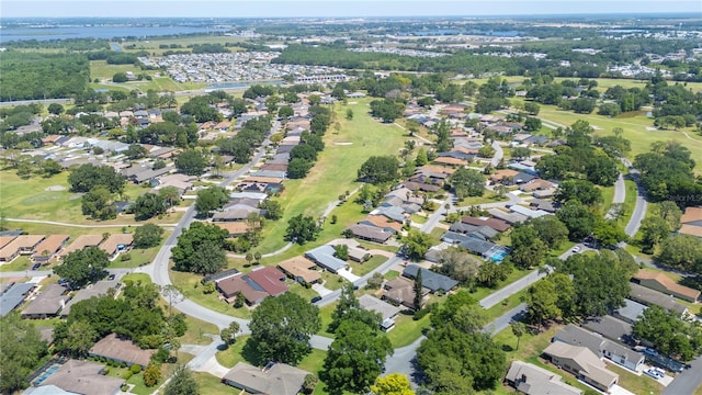 bird's eye view featuring a residential view and a water view