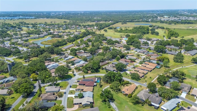 aerial view featuring a water view and a residential view