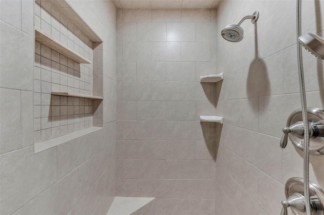 room details with a tile shower