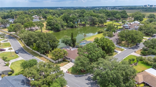 aerial view of residential area with a nearby body of water