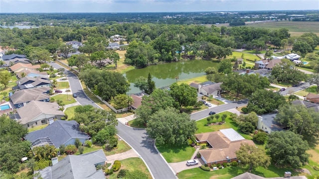 aerial perspective of suburban area featuring a large body of water