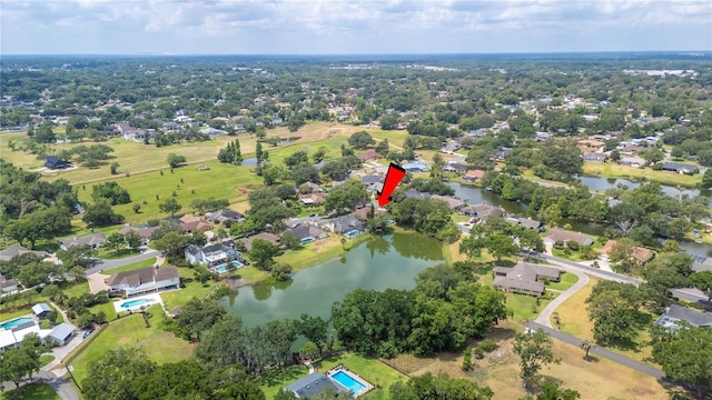 aerial overview of property's location featuring a large body of water and nearby suburban area