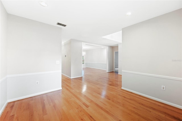 1104 Kells Ct, Lakeland, FL 33813 - unfurnished room featuring light wood-style flooring, baseboards, and recessed lighting