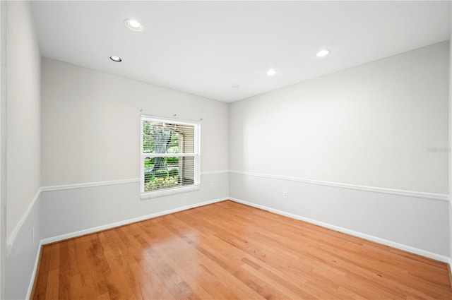 1104 Kells Ct, Lakeland, FL 33813 - unfurnished room featuring light wood-style floors, baseboards, and recessed lighting