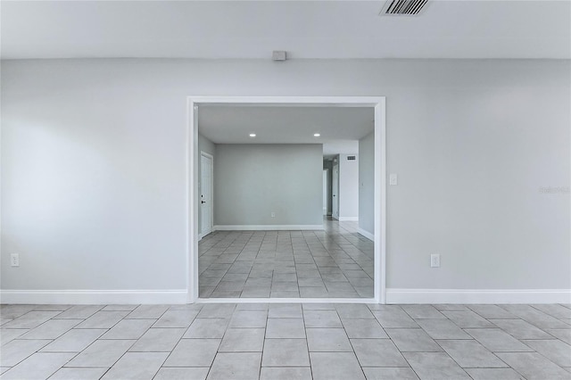 spare room featuring recessed lighting, visible vents, baseboards, and light tile patterned flooring