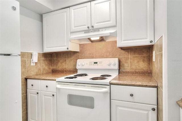 kitchen featuring white cabinets, under cabinet range hood, backsplash, light countertops, and white appliances