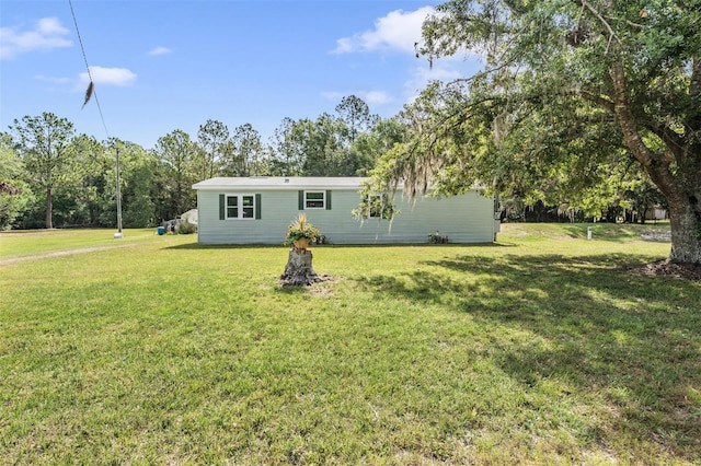 exterior space with a yard