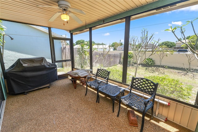 sunroom / solarium with ceiling fan