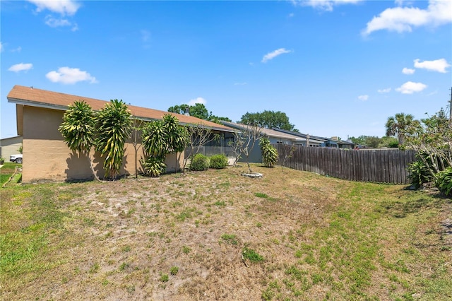 view of yard with fence
