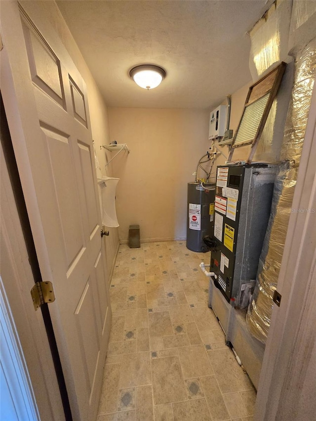 911 White Ln NE, Steinhatchee, FL 32359 - interior space featuring heating unit and water heater