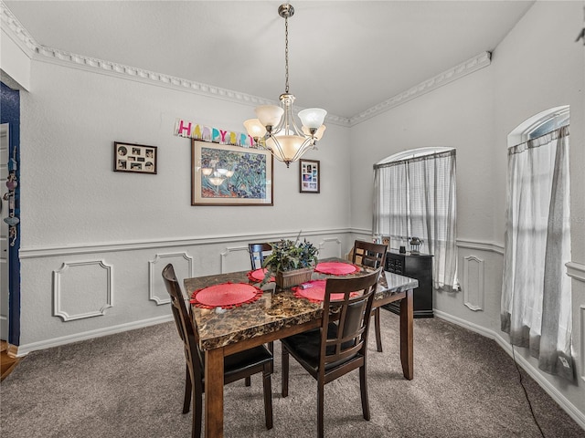 2033 Normandy Heights Dr, Winter Haven, FL 33880 - dining space featuring carpet flooring, a chandelier, and baseboards