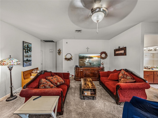 2033 Normandy Heights Dr, Winter Haven, FL 33880 - carpeted living room featuring ceiling fan and baseboards
