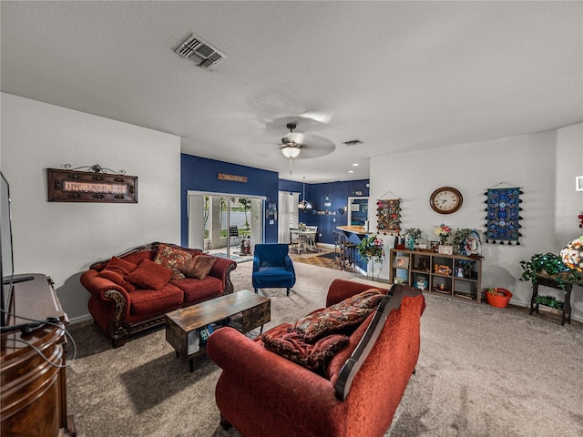 2033 Normandy Heights Dr, Winter Haven, FL 33880 - living area with carpet, baseboards, and ceiling fan