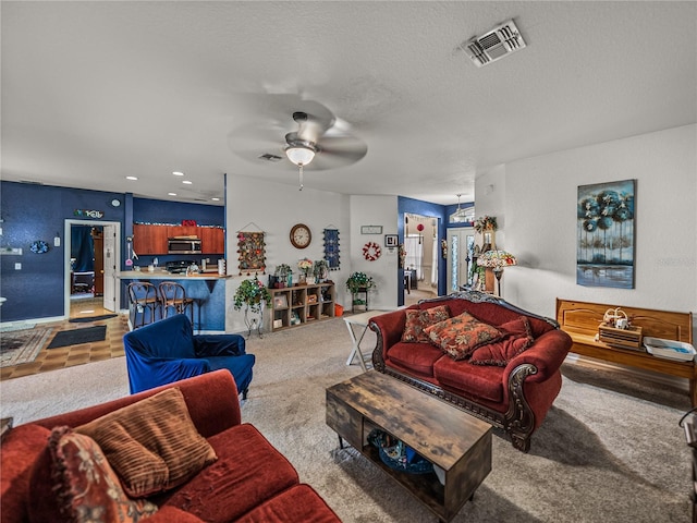 2033 Normandy Heights Dr, Winter Haven, FL 33880 - living area featuring carpet floors and a ceiling fan