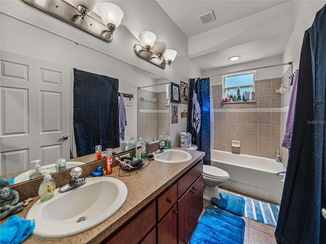 2033 Normandy Heights Dr, Winter Haven, FL 33880 - full bath with toilet, shower / bathtub combination with curtain, and double vanity