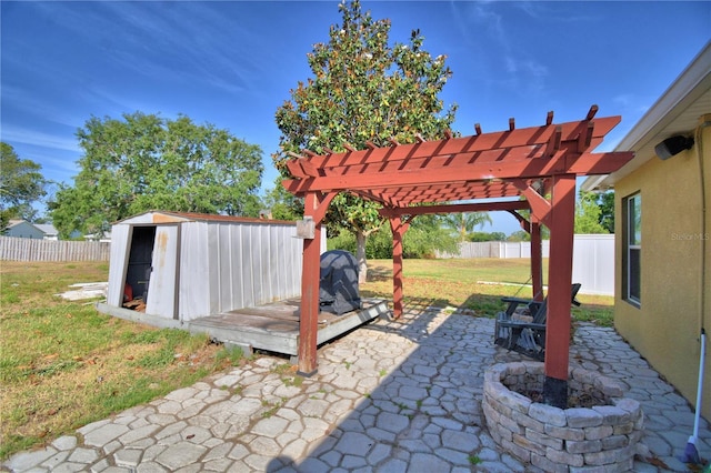 3684 Madbury Cir, Lakeland, FL 33810 - view of patio with a pergola, an outbuilding, a shed, and a fenced backyard