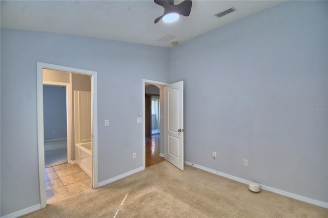 3684 Madbury Cir, Lakeland, FL 33810 - unfurnished bedroom featuring baseboards, visible vents, carpet, and ceiling fan