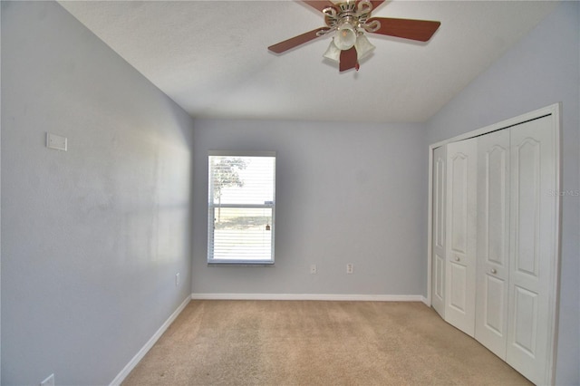 3684 Madbury Cir, Lakeland, FL 33810 - unfurnished bedroom featuring baseboards, a closet, and light colored carpet