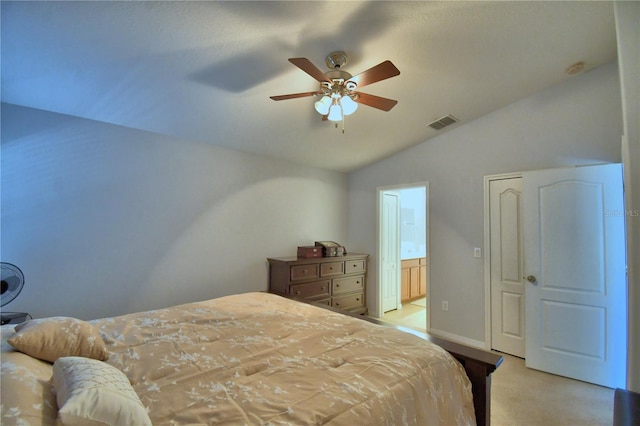 3684 Madbury Cir, Lakeland, FL 33810 - bedroom with light carpet, vaulted ceiling, visible vents, a ceiling fan, and ensuite bath