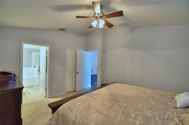 3684 Madbury Cir, Lakeland, FL 33810 - tiled bedroom with ensuite bath, lofted ceiling, and visible vents