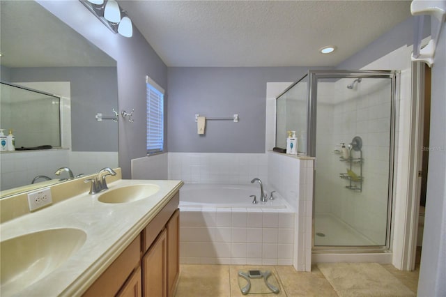 3684 Madbury Cir, Lakeland, FL 33810 - full bathroom with a shower stall, a bath, and a sink