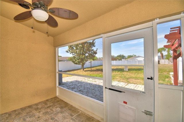 3684 Madbury Cir, Lakeland, FL 33810 - unfurnished sunroom with a healthy amount of sunlight and ceiling fan