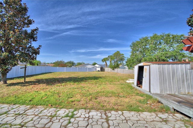 3684 Madbury Cir, Lakeland, FL 33810 - view of yard with an outbuilding, a shed, and fence
