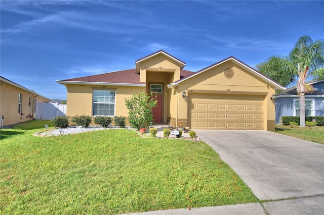 3684 Madbury Cir, Lakeland, FL 33810 - single story home featuring a front lawn, driveway, fence, an attached garage, and stucco siding