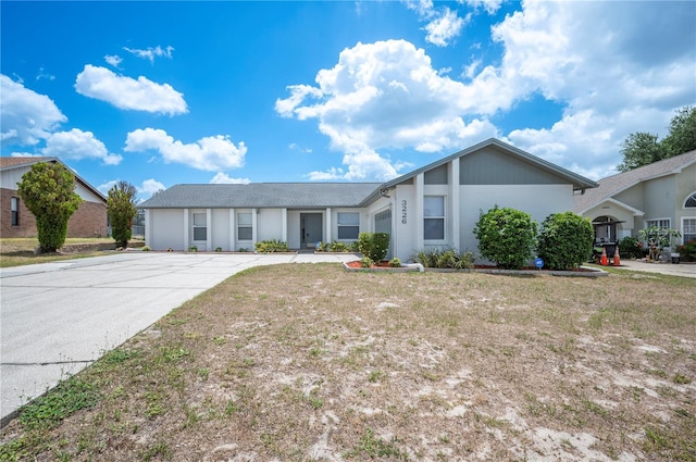 3226 Cherry Hill Cir S, Lakeland, FL 33810 - ranch-style home with an attached garage, stucco siding, and driveway