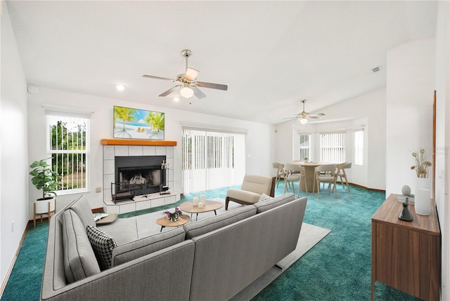 3226 Cherry Hill Cir S, Lakeland, FL 33810 - living room with carpet floors, visible vents, baseboards, ceiling fan, and a tile fireplace