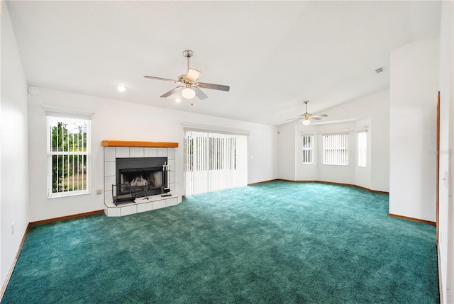3226 Cherry Hill Cir S, Lakeland, FL 33810 - unfurnished living room with baseboards, ceiling fan, carpet floors, and a tile fireplace