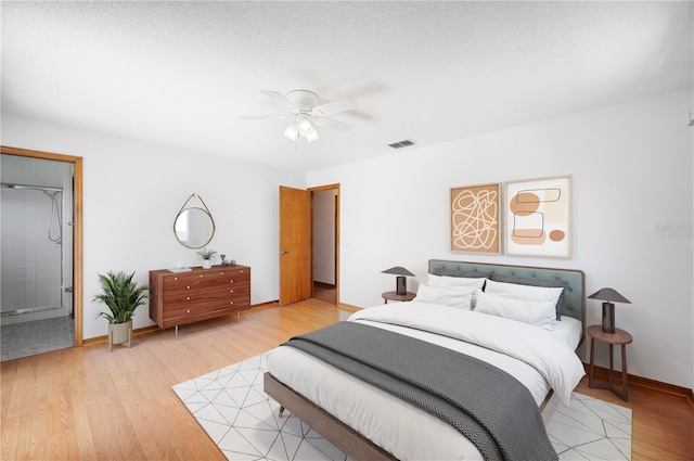 3226 Cherry Hill Cir S, Lakeland, FL 33810 - bedroom with baseboards, ceiling fan, light wood-style flooring, and visible vents