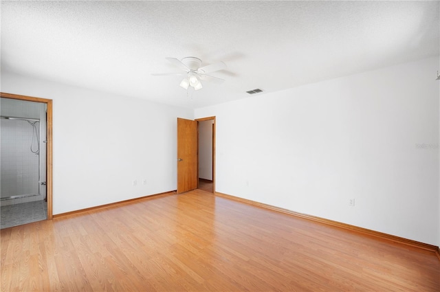 3226 Cherry Hill Cir S, Lakeland, FL 33810 - spare room with baseboards, light wood-style flooring, ceiling fan, and visible vents