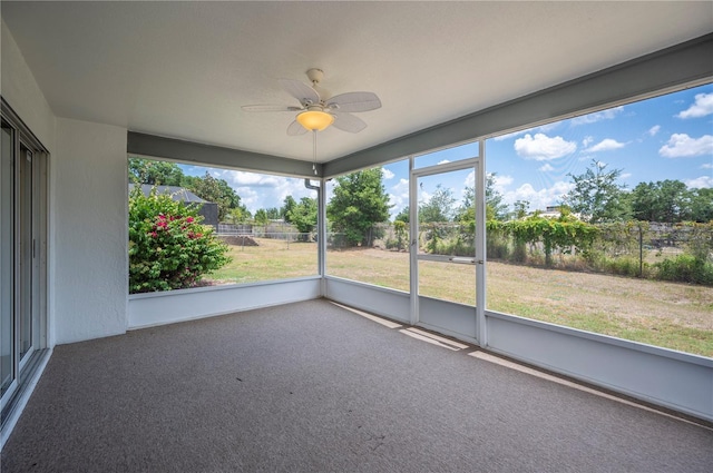 3226 Cherry Hill Cir S, Lakeland, FL 33810 - unfurnished sunroom featuring a ceiling fan