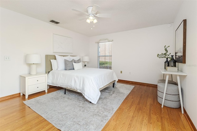 3226 Cherry Hill Cir S, Lakeland, FL 33810 - bedroom featuring light wood-style flooring and a ceiling fan