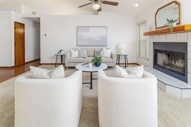 3226 Cherry Hill Cir S, Lakeland, FL 33810 - living area with lofted ceiling, ceiling fan, a tile fireplace, wood finished floors, and recessed lighting