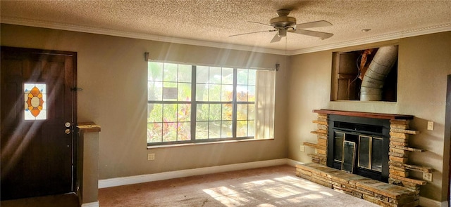 unfurnished living room featuring plenty of natural light, a ceiling fan, carpet, and a stone fireplace