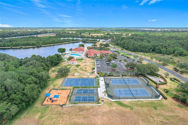 aerial view featuring a water view and a view of trees