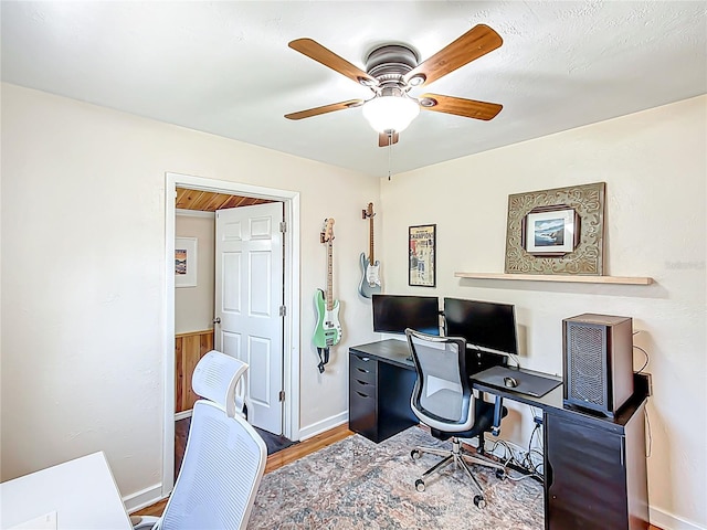 737 Kensington St, Lakeland, FL 33803 - office area featuring a ceiling fan, wood finished floors, and baseboards