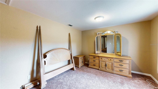 410 Orange St, Bradley, FL 33835 - bedroom with visible vents, baseboards, and light carpet