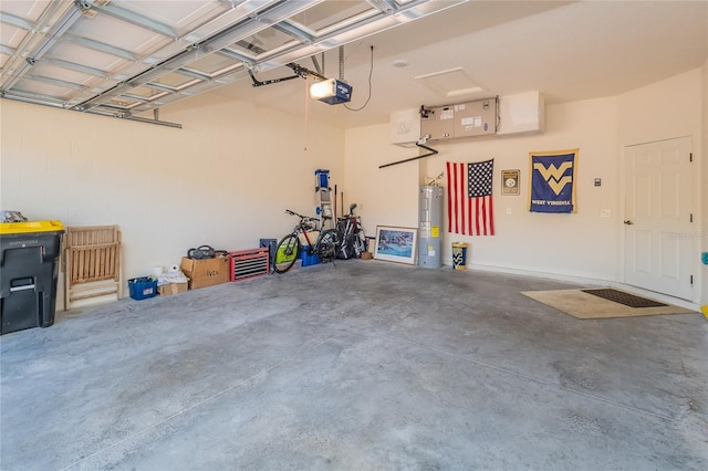 garage with a garage door opener and electric water heater