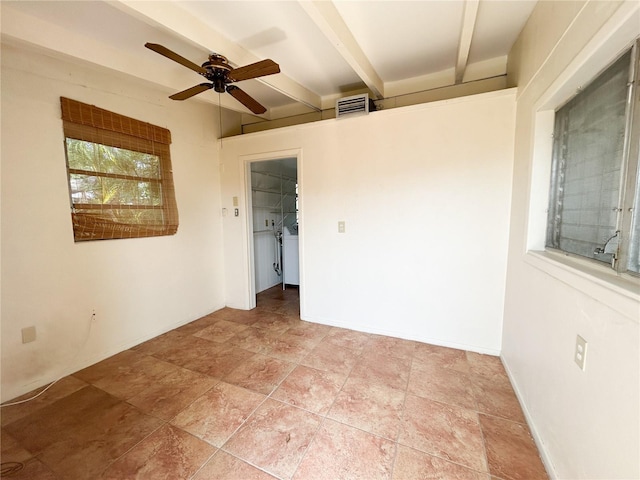 2415 Goldenrod St, Sarasota, FL 34239 - spare room featuring a ceiling fan and beamed ceiling