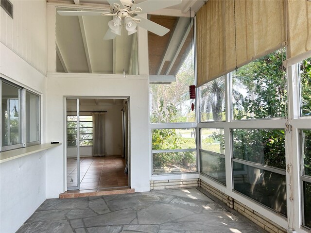 2415 Goldenrod St, Sarasota, FL 34239 - unfurnished sunroom featuring a ceiling fan and vaulted ceiling