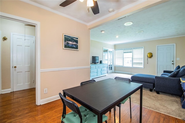 422 E Belmar St, Lakeland, FL 33803 - interior space featuring crown molding, wood finished floors, baseboards, ceiling fan, and recessed lighting