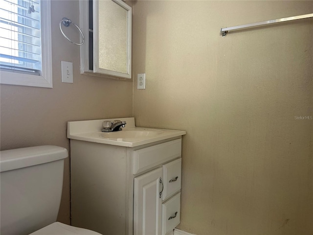 422 E Belmar St, Lakeland, FL 33803 - half bathroom featuring vanity and toilet