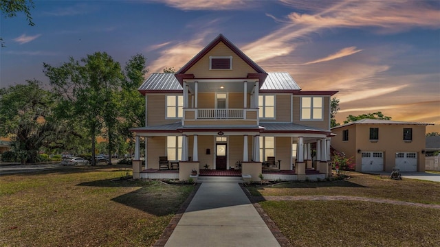410 S Broadway Ave, Bartow, FL 33830 - view of front facade featuring a porch, metal roof, a yard, and concrete driveway